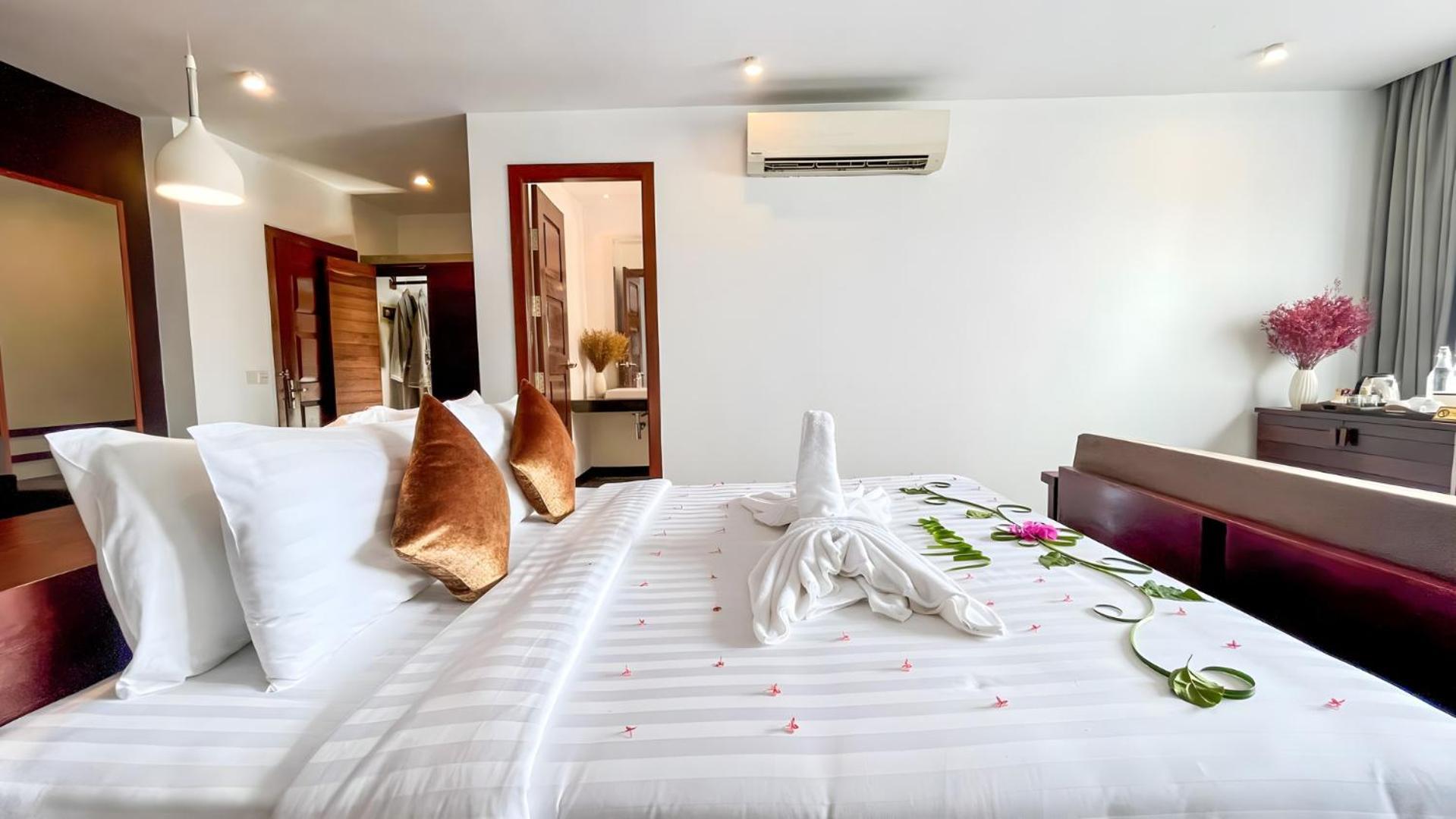 The Calm Oasis Hotel Siem Reap Phòng bức ảnh