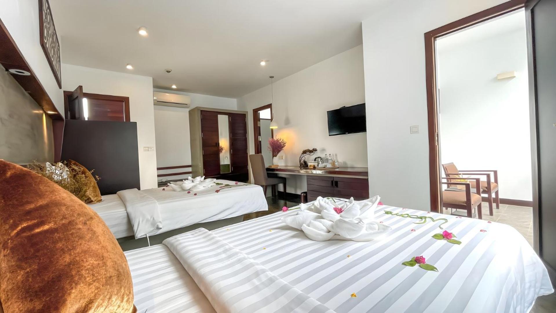 The Calm Oasis Hotel Siem Reap Phòng bức ảnh