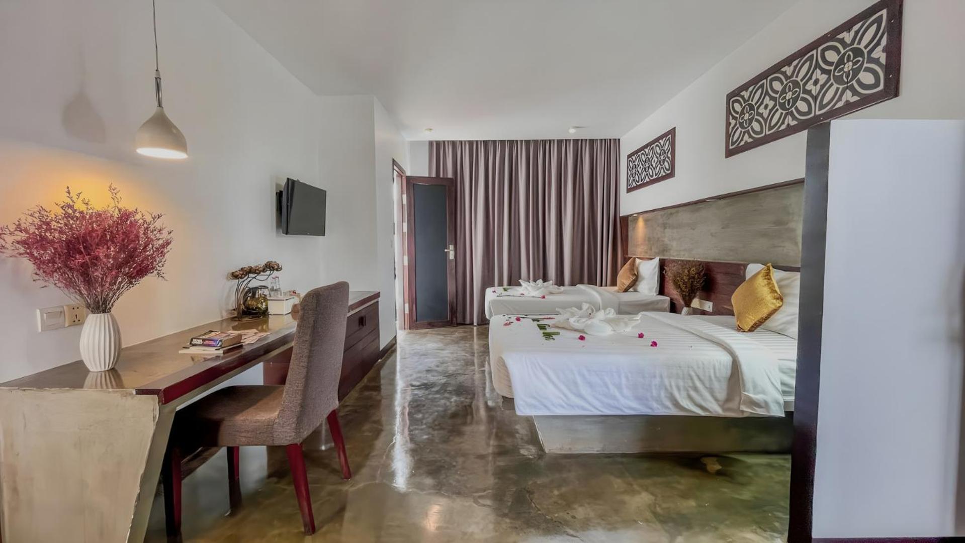 The Calm Oasis Hotel Siem Reap Phòng bức ảnh